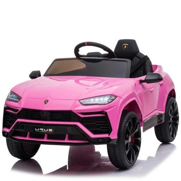 A pink Lamborghini Urus 12V electric ride-on SUV for children with black wheels and interior.