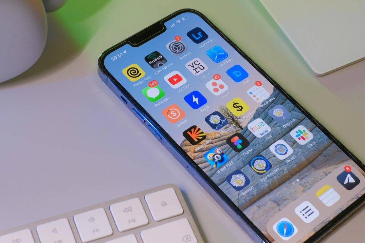 iPhone displaying home screen with apps after software update